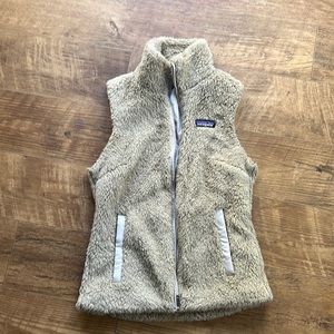 Cream colored xs Patagonia vest. Non smoking no pet home. Like new condition